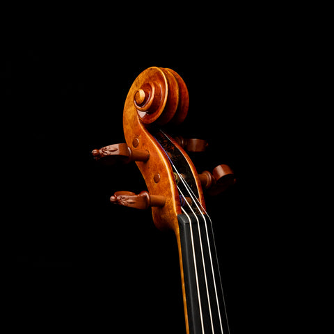 The beauty of a violin scroll inspired by the works of Amati and Stradivari