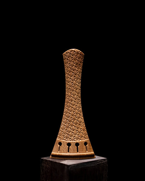 A Southern Live Oak “Triakis” tailpiece, as designed for a 109mm violin