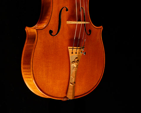 A replica of Antonio Stradivari’s 1727 "Cassavetti" viola, featuring a Mountain Mahogany "La Pucelle" tailpiece.
