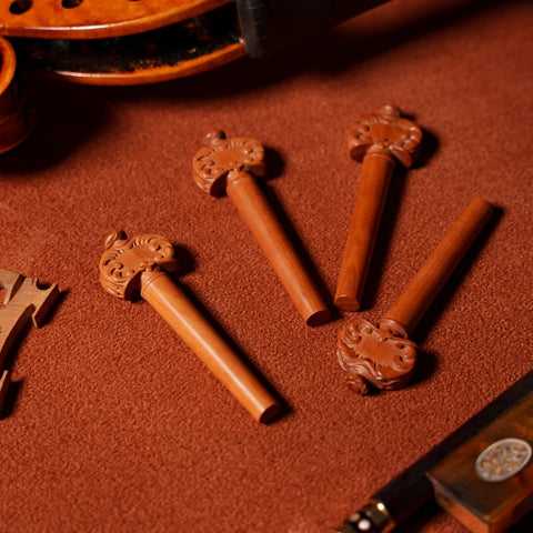 A set of “Alard” tuning pegs in mountain mahogany