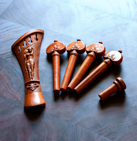 A custom set of Mountain Mahogany violin fittings