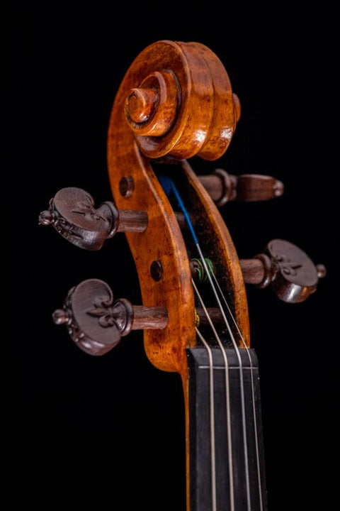 “Fleur de Lis” pegs on an original H&C composition violin scroll