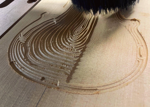 Transforming a board of reclaimed old growth spruce into a new viola